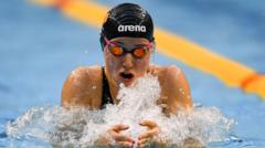 McCartney wins breaststroke bronze in Glasgow
