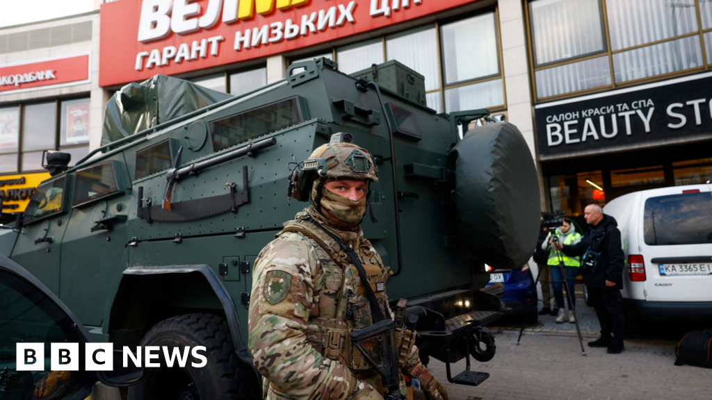 At least six killed in Kyiv as gunman opens fire and takes hostages