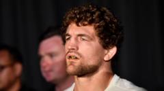 Askren retires after remarkable return a year after almost dying