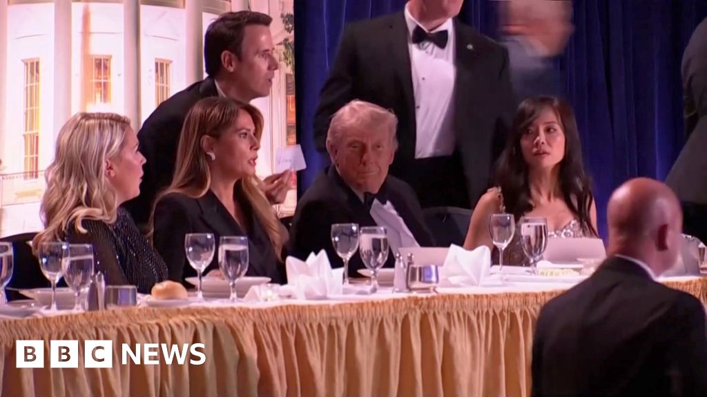 Moment Trump rushed from White House Correspondents' Dinner after  gunshots heard