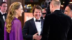 Prince and Princess of Wales share a laugh with Tom Cruise at film premiere